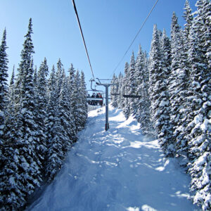 A ski lift in the winter.